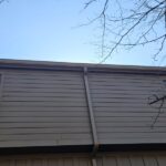 Downspout installation on home in Indian Hill Ohio directing water away from exterior wall