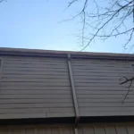 Downspout installation on home in Indian Hill Ohio directing water away from exterior wall