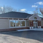 Completed roof replacement Dublin Ohio at US Bank with new shingles and seamless gutters