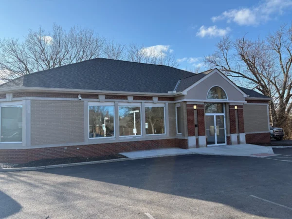 Completed roof replacement Dublin Ohio at US Bank with new shingles and seamless gutters