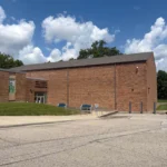 West Clermont School gymnasium in Batavia Ohio with completed roof replacement by TruCraft Roofing