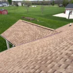 Wide view of home with new asphalt shingle roof installed Harrison IN