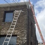 Exterior view of the Hamilton County Democratic Headquarters after a Pleasant Ridge roof replacement.