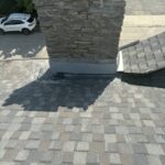 Chimney flashing and CertainTeed Landmark PRO Driftwood shingles on a completed Pleasant Ridge roof replacement.