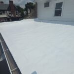 TruCraft installing a new roof on the Hamilton County Democratic Headquarters in Pleasant Ridge.