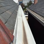 Before photo showing aging built-in box gutter with deteriorated coating prior to Bellevue KY box gutter restoration.