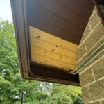 Custom-milled replacement wood installed beneath Union Township amphitheater roof